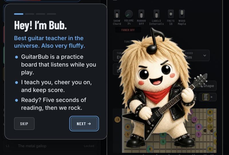 Bub, big, saying hi on the welcome card: Best guitar teacher in the universe. Also very fluffy.